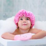 How often should children of different ages be bathed?