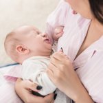 Baby restlessly eats breast milk