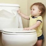 The child is afraid of the toilet